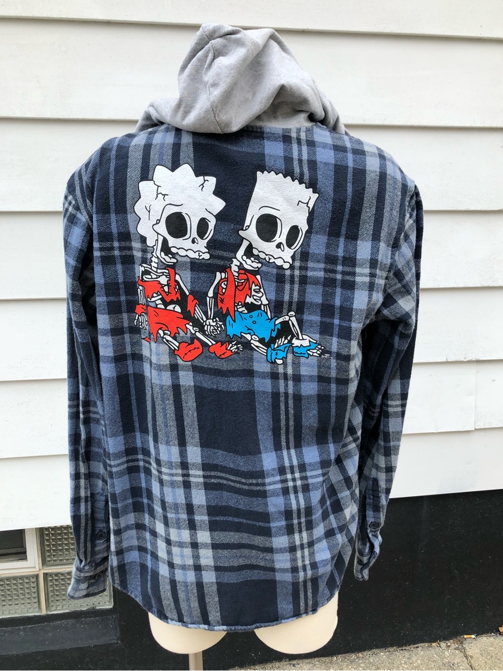 Hooded Flannel with The Simpsons Graphic on the back